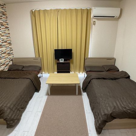 Apartament ザミッキーカールトン井尻102 Shiobaru Zewnętrze zdjęcie