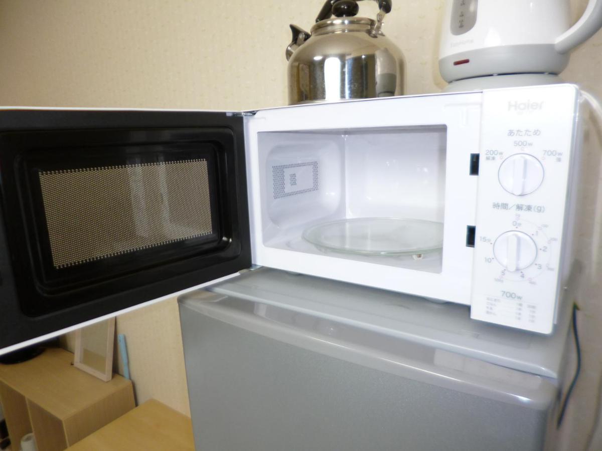 Apartament ザミッキーカールトン井尻102 Shiobaru Zewnętrze zdjęcie