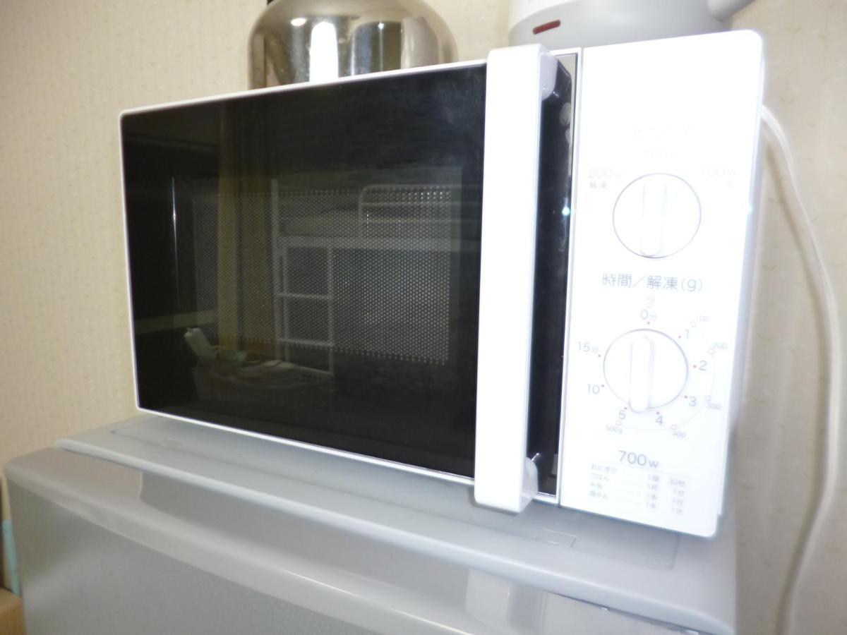 Apartament ザミッキーカールトン井尻102 Shiobaru Zewnętrze zdjęcie