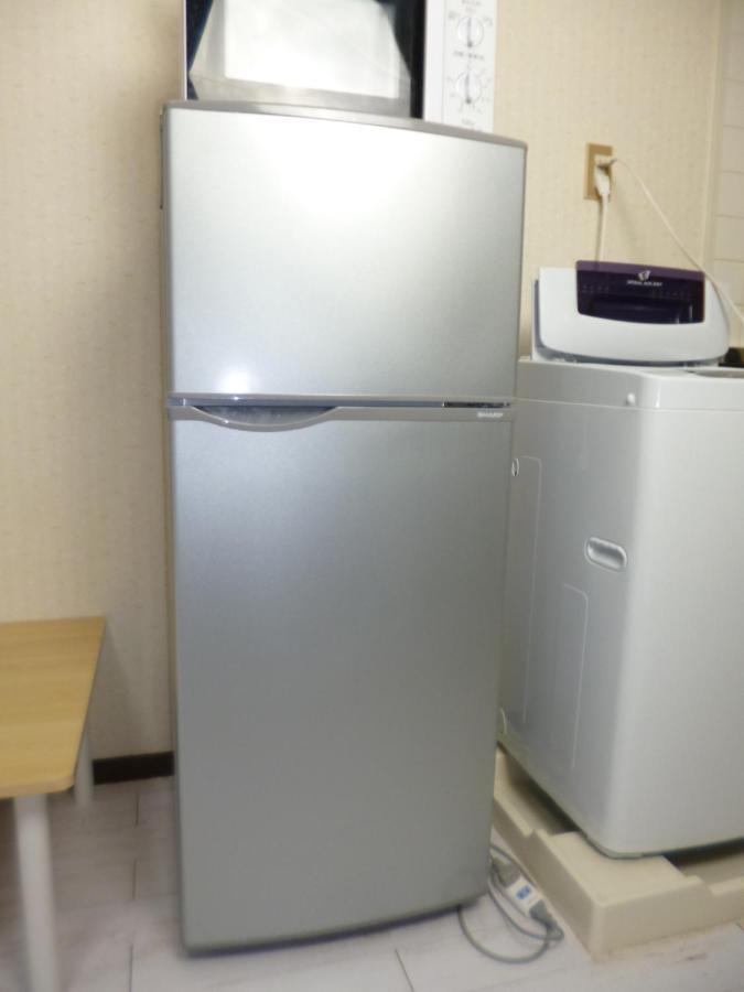 Apartament ザミッキーカールトン井尻102 Shiobaru Zewnętrze zdjęcie