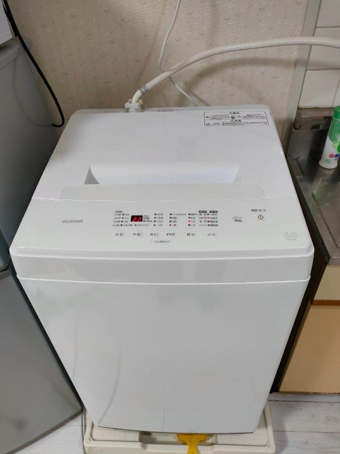 Apartament ザミッキーカールトン井尻102 Shiobaru Zewnętrze zdjęcie
